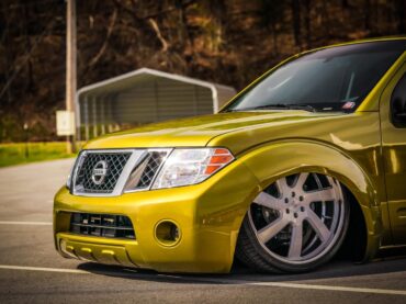 Bagged 2008 Nissan Pathfinder with Custom Paint  Stock-floored on 24" Wheels