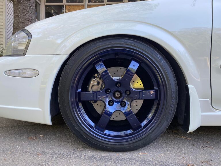 5thgen Nissan Maxima with Custom Blue 350z V1 Track Edition Rays Wheels